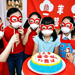 **

A group of children at a Kong Soon-yi themed party. They are wearing homemade Kong Soon-yi masks, baking a cake decorated with Kong Soon-yi characters, and having fun playing games. Focus on the joy and creativity.

**
